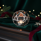 Silver geometric holder on forest velvet mantel