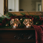 Tall geometric candle holder pair on walnut mantel